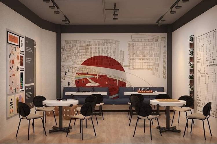 Phòng cà phê hiện đại với nội thất ấm cúng và bức tranh tường nghệ thuật.