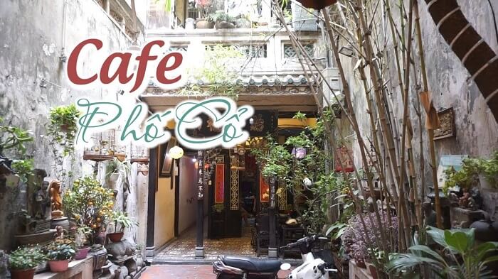Quán Cafe Phố Cổ Hà Nội với không gian hoài cổ, cây xanh xung quanh.