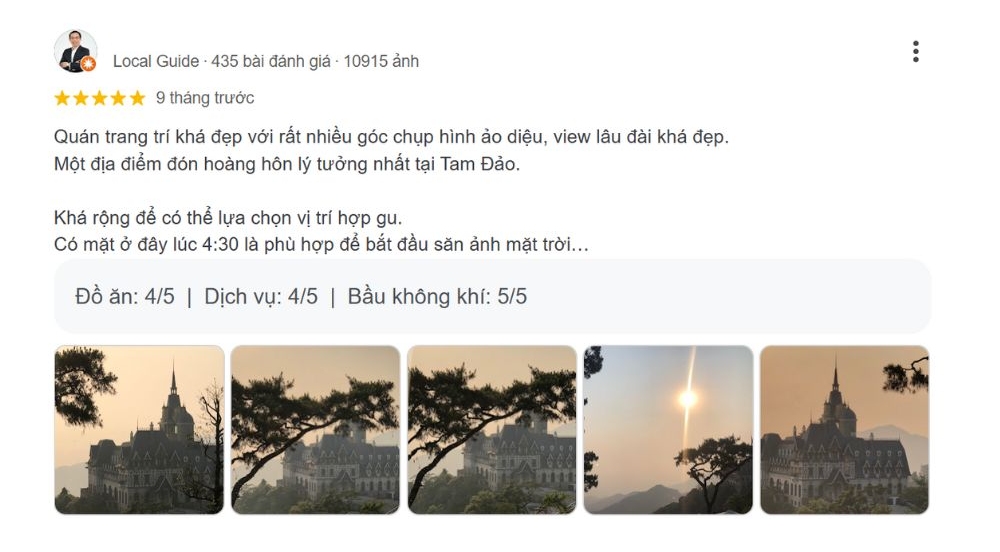 Khám Phá Quán Gió Tam Đảo: Trải Nghiệm Cafe Trên Mây Với View Tuyệt Đẹp 8 Hình ảnh một lâu đài giữa khung cảnh thiên nhiên lúc hoàng hôn, với mặt trời lặn phía sau hàng cây.