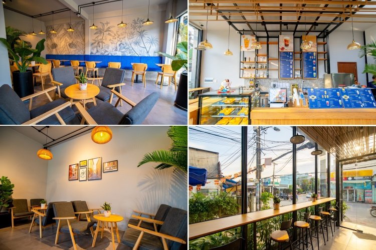 Qu&aacute;n c&agrave; ph&ecirc; hiện đại với nội thất tho&aacute;ng đ&atilde;ng, b&agrave;n ghế gỗ, &aacute;nh s&aacute;ng tự nhi&ecirc;n v&agrave; trang tr&iacute; c&acirc;y xanh.