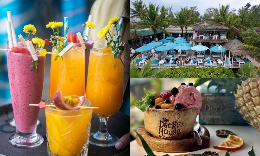 Khám Phá Hơn 10 Quán Cafe Đẹp Ở Hội An Cho Góc Sống Ảo Triệu Like 7 Các ly đồ uống màu sắc rực rỡ và món tráng miệng trong quán cafe bên bãi biển với ô xanh và cây cọ.