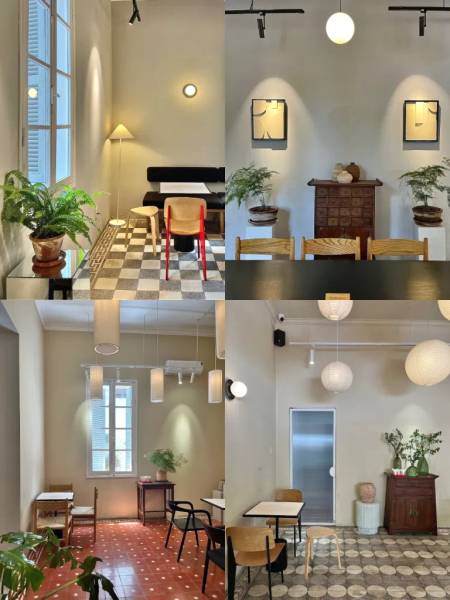 Kh&ocirc;ng gian qu&aacute;n c&agrave; ph&ecirc; với b&agrave;n ghế, c&acirc;y xanh, &aacute;nh s&aacute;ng tự nhi&ecirc;n, thiết kế hiện đại v&agrave; trang tr&iacute; đơn giản.