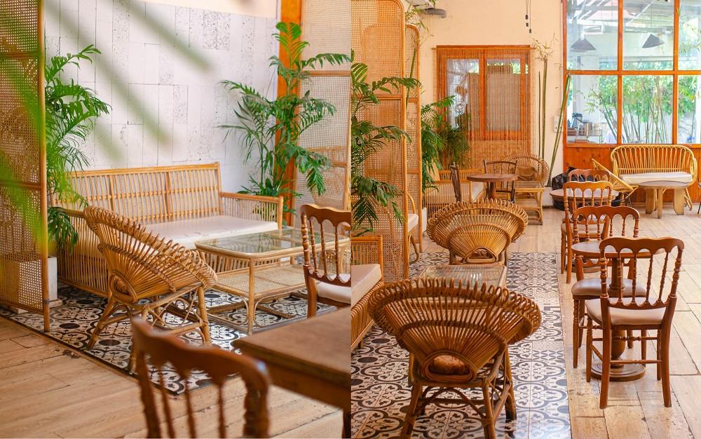 Khám Phá 12+ Quán Cafe Đẹp Hút Triệu View Tại TPHCM Năm 2025 8 Quán cà phê với nội thất tre, bàn ghế mây và cây xanh, tạo không gian thư giãn và ấm cúng.