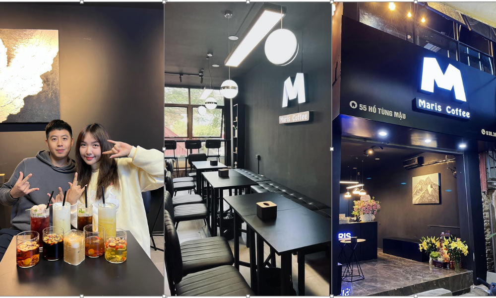 Khám Phá 14 Quán Cafe Hồ Tùng Mậu: Điểm Chill Lý Tưởng Tại Cầu Giấy 5 Quán cà phê với không gian nội thất hiện đại, biển hiệu "Maris Coffee" và hai người ngồi trước bàn đầy đồ uống.