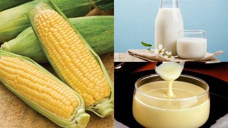 Bắp tươi, ly sữa và sữa đặc trong bát thủy tinh, bố trí trên nền gỗ và vải.