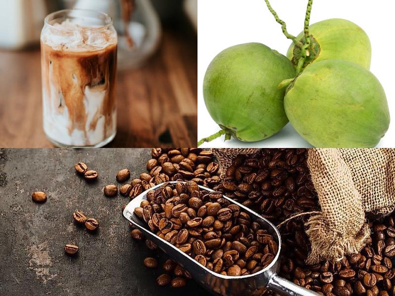 Ly c&agrave; ph&ecirc; sữa đ&aacute;, hai quả dừa xanh v&agrave; hạt c&agrave; ph&ecirc; trong muỗng kim loại tr&ecirc;n nền vải bố.