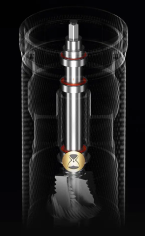 Khám Phá 7 Bí Kíp Lựa Chọn Máy Xay Cà Phê Cầm Tay Tuyệt Vời Nhất 4 Hình ảnh bộ phận cơ khí với các vòng đệm màu đỏ bên trong ống trong suốt, có biểu tượng đồng hồ cát.