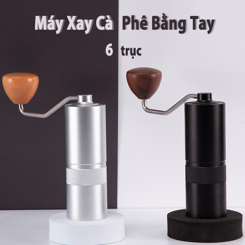 Khám Phá 7 Bí Kíp Lựa Chọn Máy Xay Cà Phê Cầm Tay Tuyệt Vời Nhất 6 Hai máy xay cà phê bằng tay màu bạc và đen với tay cầm gỗ, nền trắng đen và chữ mô tả sản phẩm.