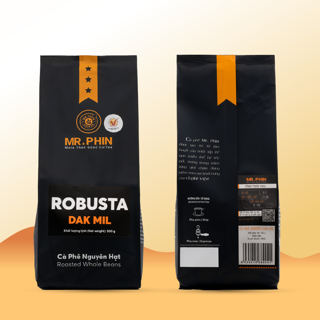Hai g&oacute;i c&agrave; ph&ecirc; Robusta Dak Mil m&agrave;u đen, c&oacute; th&ocirc;ng tin sản phẩm v&agrave; hướng dẫn sử dụng.