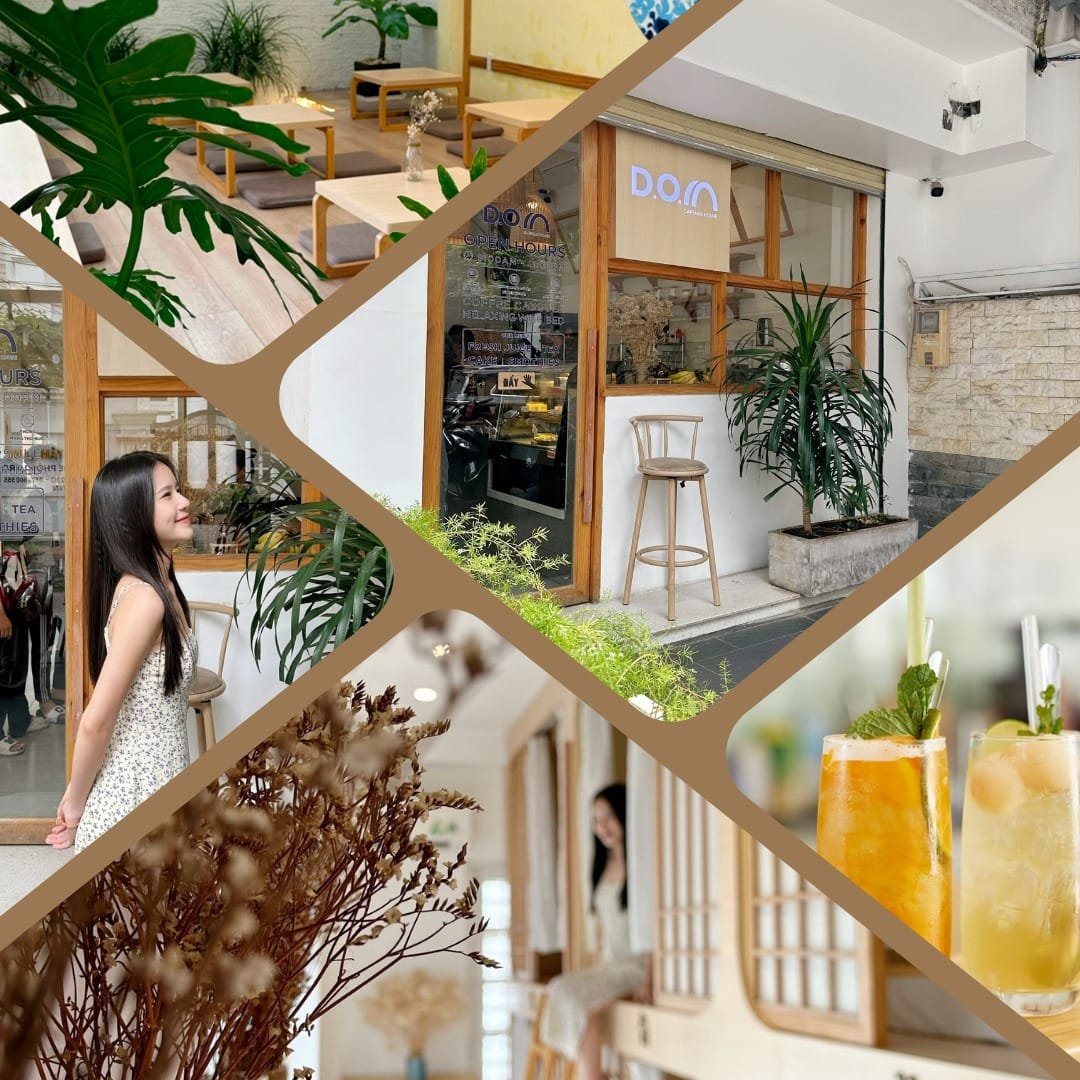 Quán cà phê với không gian nội thất gỗ, cây xanh, đồ uống và hoa trang trí. Người ngồi thư giãn bên trong.