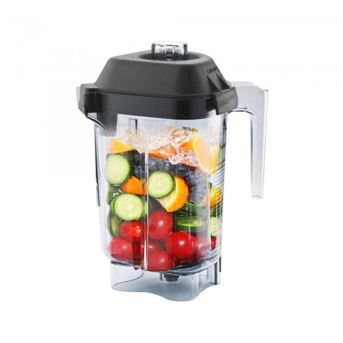 Máy xay sinh tố chứa đầy rau củ và trái cây tươi, sẵn sàng để chế biến nước ép hoặc sinh tố.
