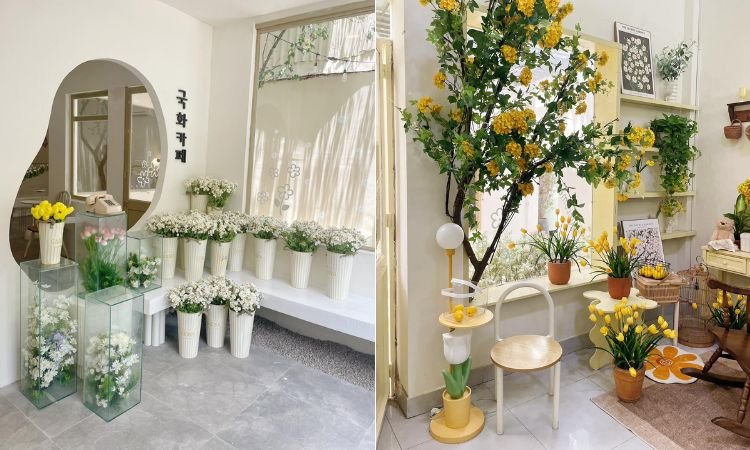 Cửa h&agrave;ng hoa trang tr&iacute; với b&igrave;nh hoa trắng v&agrave; v&agrave;ng, c&acirc;y cối xanh tươi, kh&ocirc;ng gian s&aacute;ng v&agrave; ấm c&uacute;ng.