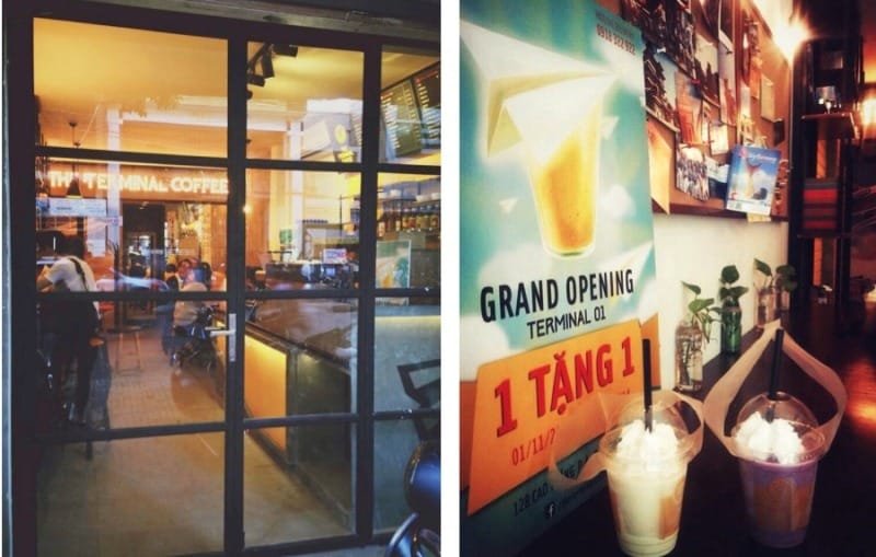 Top 32 thương hiệu nhượng quyền cafe siêu lợi nhuận 29 Cửa sổ nhìn vào quán cà phê; bên trong có bảng quảng cáo khuyến mãi và hai ly đồ uống trên bàn.