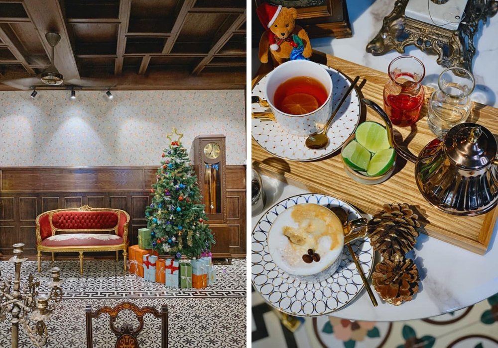 Phòng khách trang trí Giáng sinh với cây thông, ghế sofa cổ điển; bên cạnh là bàn trà với đồ uống và đồ trang trí.